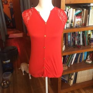 Bright red blouse